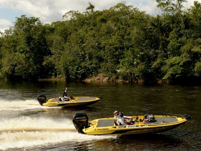 two bass boats from Amazon Xplor at the river